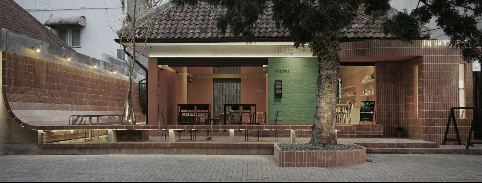 Mutu Loka cafe building with brick facade